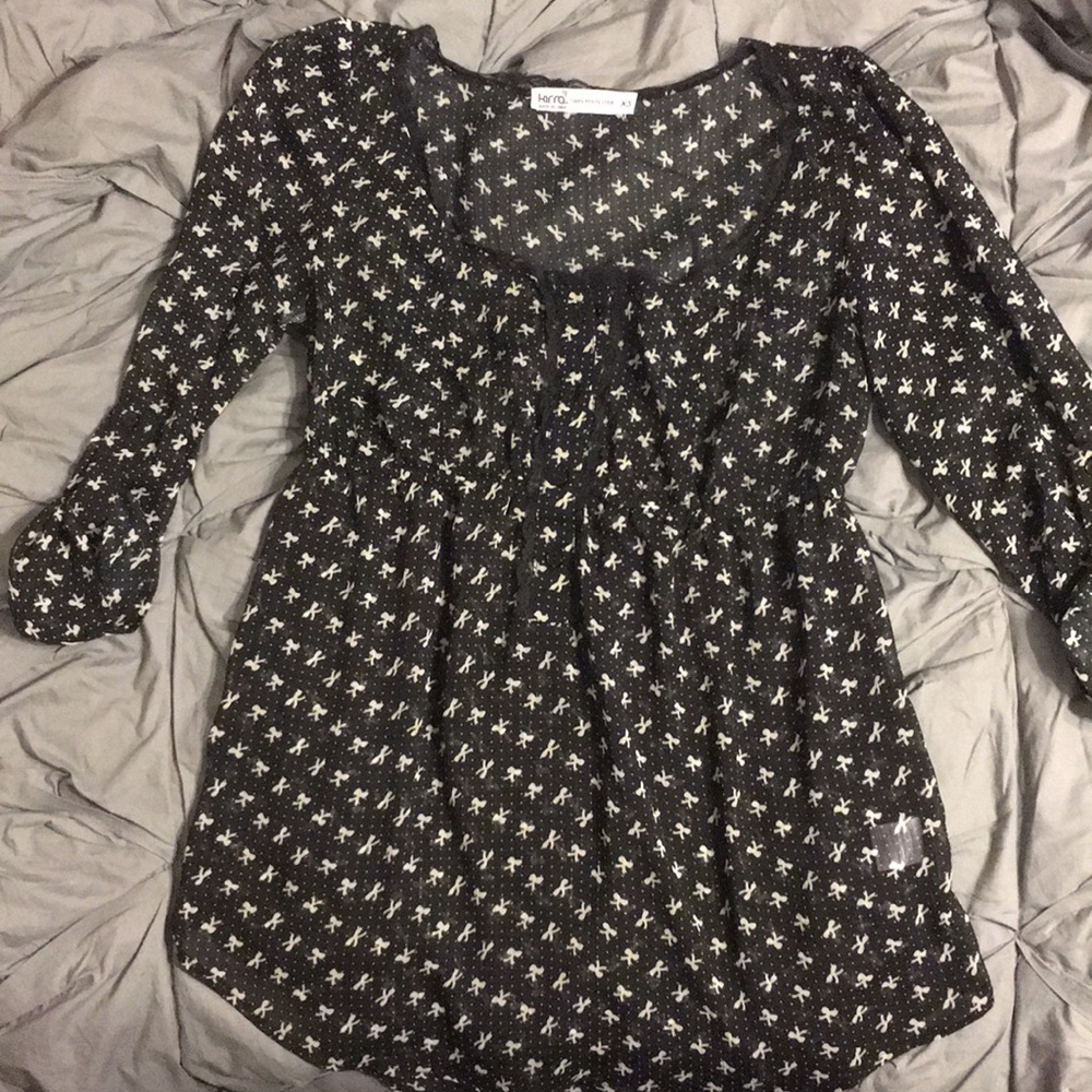 Black top with white bow print